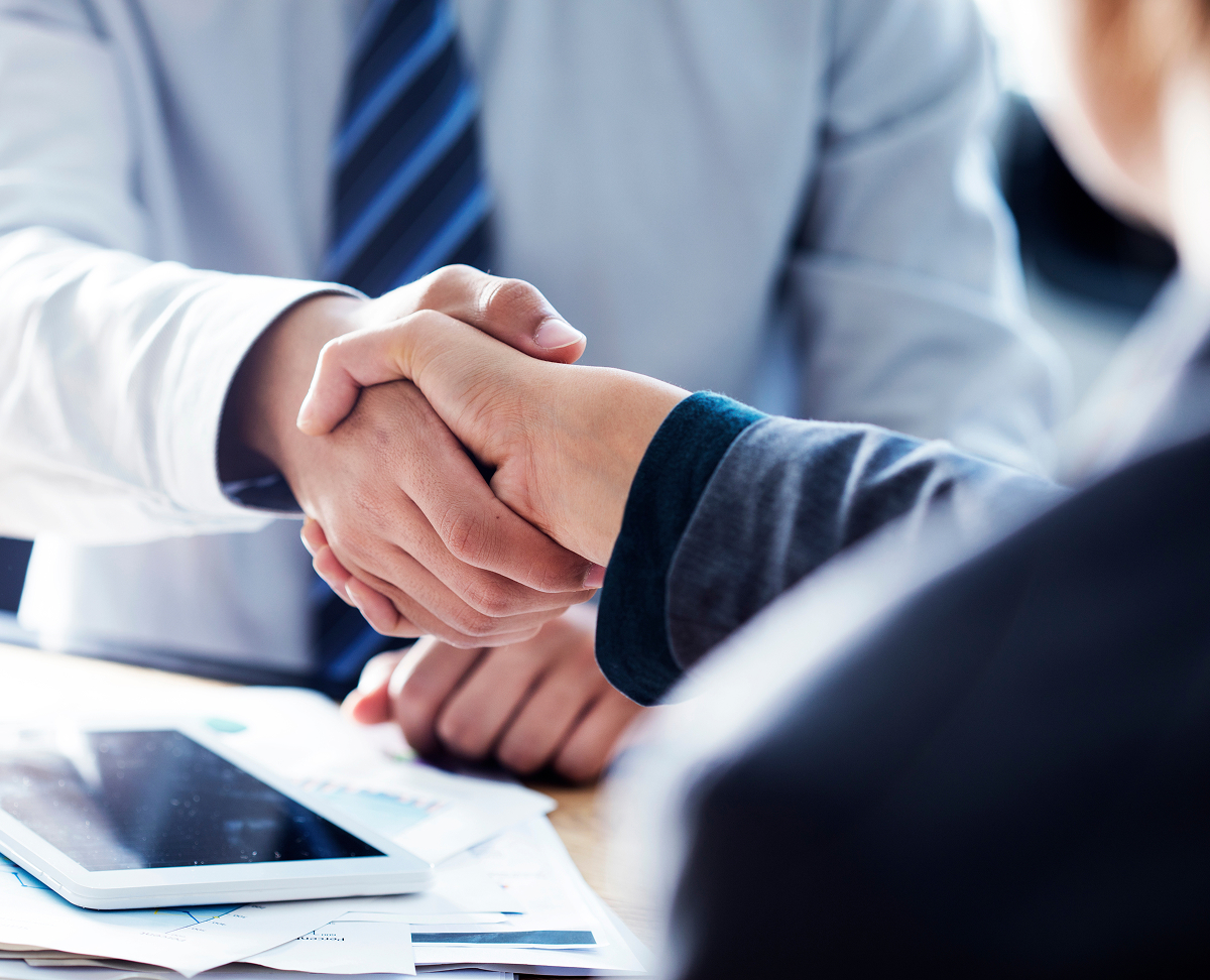 Two people shaking hands